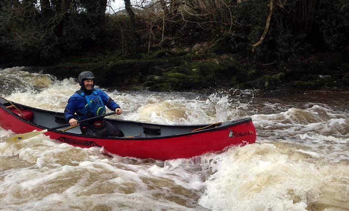 Advanced paddling canoe on the river